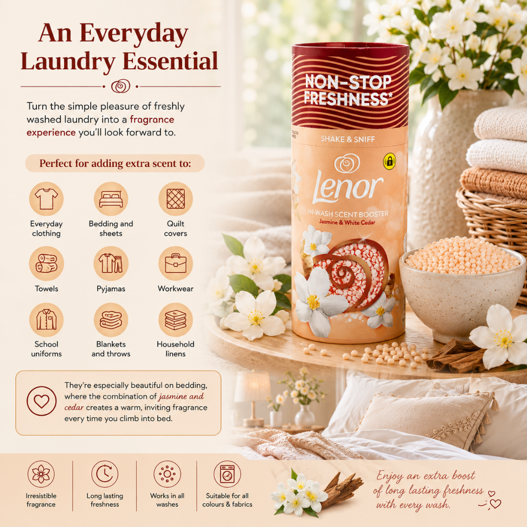 A cylindrical canister of Lenor Fresh & Scented Powder in 'Pajam & Pink' scent, styled on a wooden tray with bedding, flowers, and a bowl of powder. The left side features promotional text and icons detailing its use for various bedding and clothing items.